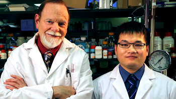 Dr. James F. Hainfeld and Hui Huang in the Nanoprobes Laboratory.